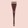 A single Aspilon Cosmetics flat-top makeup brush with a dark brown handle and bristles, featuring a silver Aspilon logo.