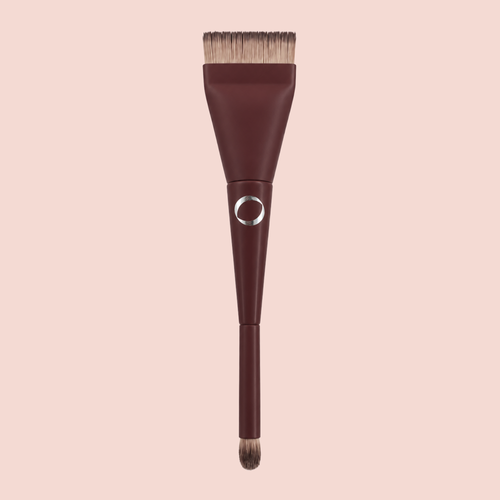 A single Aspilon Cosmetics flat-top makeup brush with a dark brown handle and bristles, featuring a silver Aspilon logo.